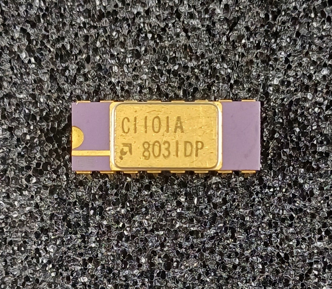 AMD C1101A 256-Bit SRAM in a Purple Ceramic Dual Inline Package with Gold Top and Pins